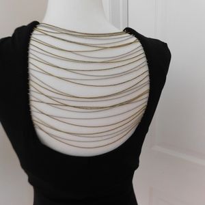 👉 Chained back Top